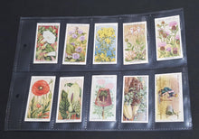 Load image into Gallery viewer, Cigarette collectors cards in protective sleeve